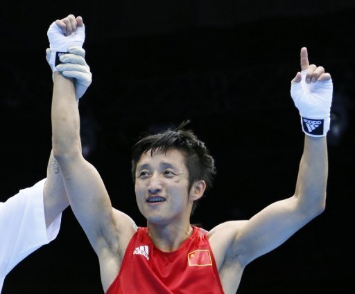 Zou Shiming is declared the victor after defeating Paddy Barnes at the London Olympics on August 10, 2012 Zou Shiming is declared the victor after defeating Paddy Barnes at the London Olympics on August 10, 2012
