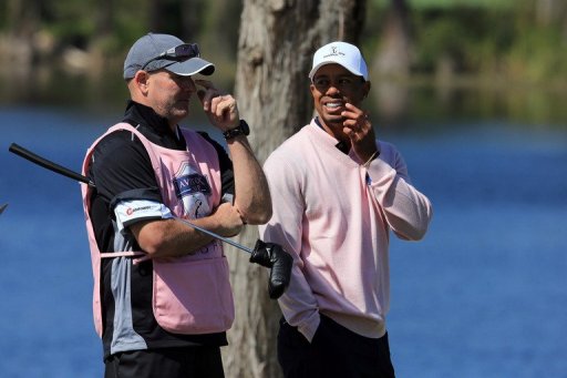 Tiger Woods with caddie Joe LaCava during the final day of the 2013 Tavistock Cup Matches on March 26, 2013 in Orlando Tiger Woods with caddie Joe LaCava during the final day of the 2013 Tavistock Cup Matches on March 26, 2013 in Orlando