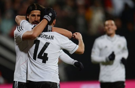 Germany's Holger Badstuber and Sami Khedira (L) celebrate scoring in Nuremberg, on March 26, 2013 Germany's Holger Badstuber and Sami Khedira (L) celebrate scoring in Nuremberg, on March 26, 2013