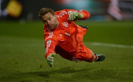 German goalkeeper Manuel Neuer dives for a ball in Nuremberg, on March 26, 2013 German goalkeeper Manuel Neuer dives for a ball in Nuremberg, on March 26, 2013