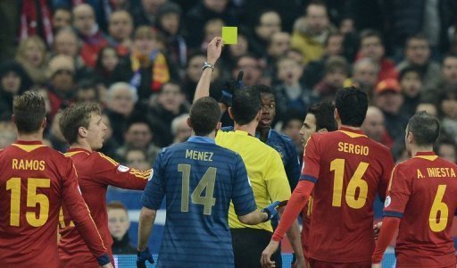 France midfielder Paul Pogba receives a yellow card during the World Cup qualifier against Spain on March 26, 2013 France midfielder Paul Pogba receives a yellow card during the World Cup qualifier against Spain on March 26, 2013
