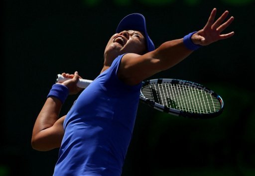 Li Na in action against Serena Williams at the Miami Masters on March 26, 2013 Li Na in action against Serena Williams at the Miami Masters on March 26, 2013