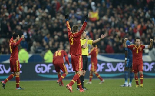 Spanish players celebrate at the end of the World Cup qualifier against France on March 26, 2013 Spanish players celebrate at the end of the World Cup qualifier against France on March 26, 2013