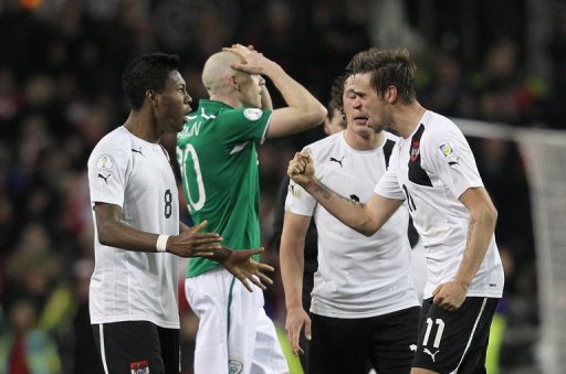 Austria's Martin Harnik (R) and David Alaba celebrate at the final whistle on March 26, 2013 Austria's Martin Harnik (R) and David Alaba celebrate at the final whistle on March 26, 2013