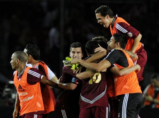 Venezuela's players celebrate defeating Colombia in a World Cup qualifier on March 26, 2013 Venezuela's players celebrate defeating Colombia in a World Cup qualifier on March 26, 2013