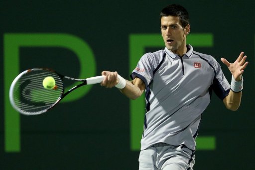 Novak Djokovic returns a shot to Tommy Haas at the Miami Masters on March 26, 2013 Novak Djokovic returns a shot to Tommy Haas at the Miami Masters on March 26, 2013