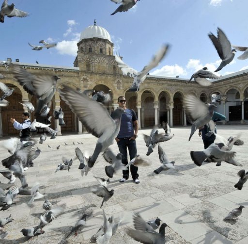 Oussama Mellouli poses in the Kasbah square in Tunis on March 22, 2013 Oussama Mellouli poses in the Kasbah square in Tunis on March 22, 2013