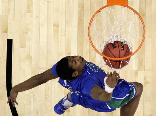 Eric McKnight of the Florida Gulf Coast Eagles dunks the ball on March 24, 2013 Eric McKnight of the Florida Gulf Coast Eagles dunks the ball on March 24, 2013
