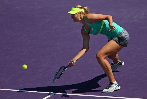 Maria Sharapova scoops out a forehand at the Miami Masters on March 27, 2013 Maria Sharapova scoops out a forehand at the Miami Masters on March 27, 2013