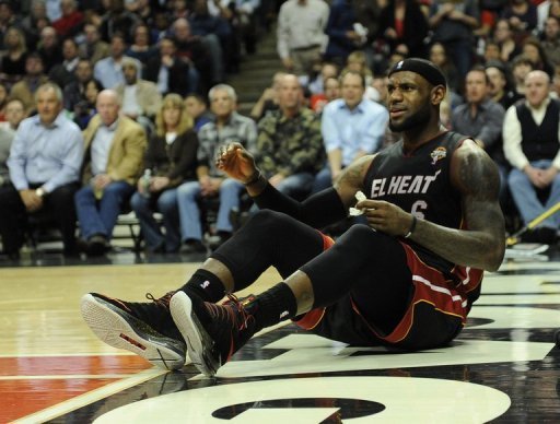 LeBron James of the Miami Heat sits on the court after being fouled by a Chicago Bulls player on March 27, 2013 LeBron James of the Miami Heat sits on the court after being fouled by a Chicago Bulls player on March 27, 2013