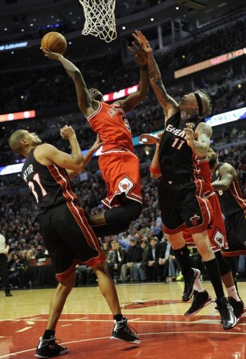 Luol Deng of the Chicago Bulls jumps for the basket on March 27, 2013 Luol Deng of the Chicago Bulls jumps for the basket on March 27, 2013