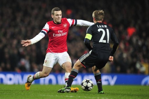 Arsenal's Jack Wilshere (L) nutmegs Bayern Munich's Philipp Lahm at the Emirates Stadium on February 19, 2013 Arsenal's Jack Wilshere (L) nutmegs Bayern Munich's Philipp Lahm at the Emirates Stadium on February 19, 2013