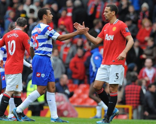 Anton Ferdinand shakes hands with brother Rio Ferdinand (R) at Old Trafford in Manchester, on April 8, 2012 Anton Ferdinand shakes hands with brother Rio Ferdinand (R) at Old Trafford in Manchester, on April 8, 2012