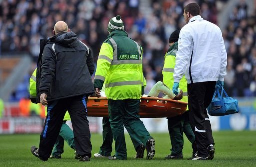 Newcastle United's defender Massadio Haidara is stretchered off the pitch in Wigan, March 17, 2013 Newcastle United's defender Massadio Haidara is stretchered off the pitch in Wigan, March 17, 2013