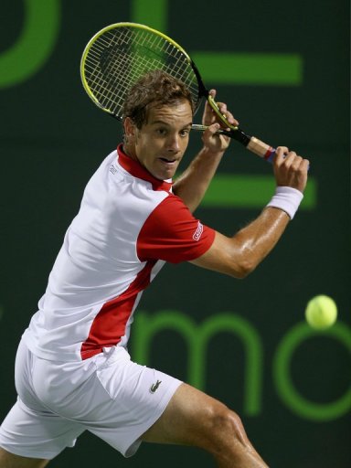 Richard Gasquet plays a backhand against Tomas Berdych in Key Biscayne, Florida, on March 28, 2013 Richard Gasquet plays a backhand against Tomas Berdych in Key Biscayne, Florida, on March 28, 2013