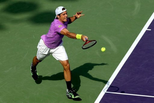 Tommy Haas returns a shot to David Ferrer at the Miami Masters on March 29, 2013 Tommy Haas returns a shot to David Ferrer at the Miami Masters on March 29, 2013