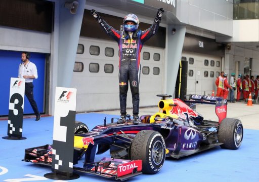 Red Bull driver Sebastian Vettel celebrates victory in the Malaysia Grand Prix in Sepang on March 24, 2013 Red Bull driver Sebastian Vettel celebrates victory in the Malaysia Grand Prix in Sepang on March 24, 2013