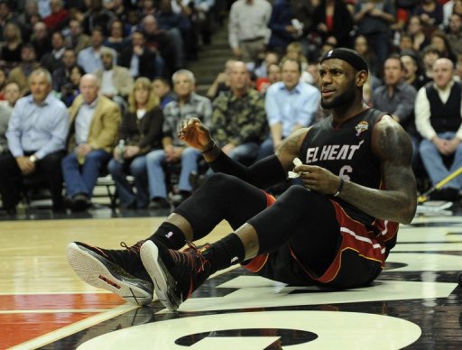 LeBron James of the Miami Heat sits on the court after being fouled on March 27, 2013 LeBron James of the Miami Heat sits on the court after being fouled on March 27, 2013