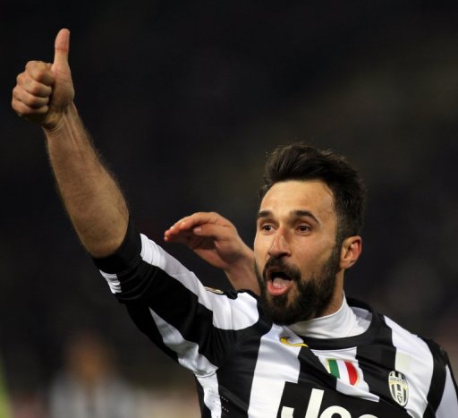 Mirko Vucinic celebrates scoring against Bologna on March 16, 2013 Mirko Vucinic celebrates scoring against Bologna on March 16, 2013