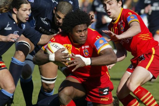 Samueli Naulu (C), during the French Top 14 rugby match on February 18, 2006, at the Aime Giral Stadium in Perpignan Samueli Naulu (C), during the French Top 14 rugby match on February 18, 2006, at the Aime Giral Stadium in Perpignan
