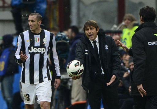 Juventus' coach Antonio Conte gestures with a ball on March 30, 2013, at the San Siro stadium in Milan Juventus' coach Antonio Conte gestures with a ball on March 30, 2013, at the San Siro stadium in Milan