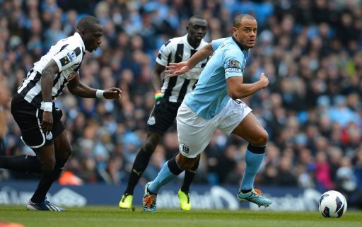 Manchester City defender Vincent Kompany in action against Newcastle on March 30, 2013 Manchester City defender Vincent Kompany in action against Newcastle on March 30, 2013