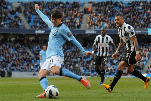 Manchester City midfielder David Silva scores the second goal in the win over Newcastle United on March 30, 2013 Manchester City midfielder David Silva scores the second goal in the win over Newcastle United on March 30, 2013