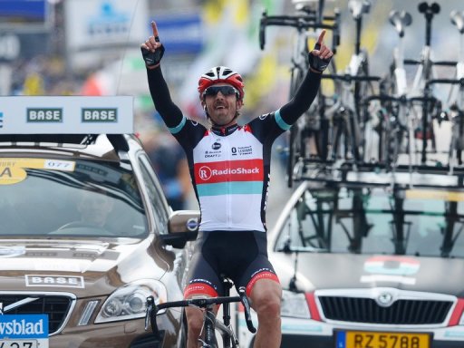 Swiss cyclist Fabian Cancellara celebrates as he crosses the finish line of the Tour of Flanders on March 31, 2013 Swiss cyclist Fabian Cancellara celebrates as he crosses the finish line of the Tour of Flanders on March 31, 2013