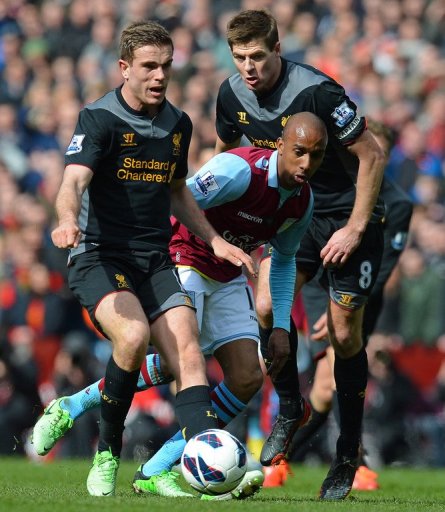 Aston Villa's Fabian Delph (centre) vies with Liverpool's Steven Gerrard (right) and Jordan Henderson (left) on March 31 Aston Villa's Fabian Delph (centre) vies with Liverpool's Steven Gerrard (right) and Jordan Henderson (left) on March 31