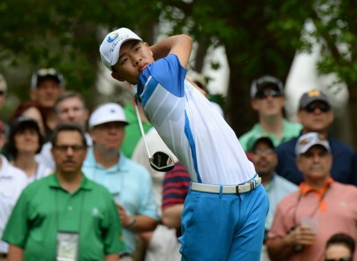 Guan Tianlang hits a shot during the first round of the 77th Masters on April 11, 2013 in Augusta Guan Tianlang hits a shot during the first round of the 77th Masters on April 11, 2013 in Augusta