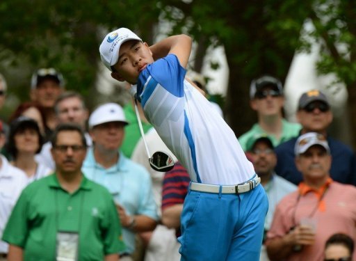 Guan Tianlang hits a shot during the first round of the 77th Masters in Augusta, on April 11, 2013 Guan Tianlang hits a shot during the first round of the 77th Masters in Augusta, on April 11, 2013