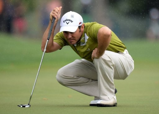 Trevor Immelman of South Africa plays in the rain during the second round of the 77th Masters, April 12, 2013 in Augusta Trevor Immelman of South Africa plays in the rain during the second round of the 77th Masters, April 12, 2013 in Augusta