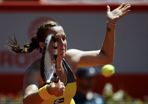 Anastasia Pavlyuchenkova returns the ball to Romina Oprandi during the Portugal Open in Oeiras on May 3, 2013 Anastasia Pavlyuchenkova returns the ball to Romina Oprandi during the Portugal Open in Oeiras on May 3, 2013
