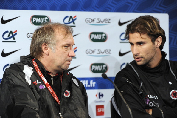 Albania's national football team coach Josip Kuze (L) speaks with his player Lorik Cana during a press conference on October 6, 2011, at the Stade de France in Saint-Denis, near Paris, on the eve of the Euro2012 qualifier match France vs. Albania. AFP PHOTO / BERTRAND GUAY AFP PHOTO / BERTRAND GUAY (Photo credit should read BERTRAND GUAY/AFP/Getty Images)