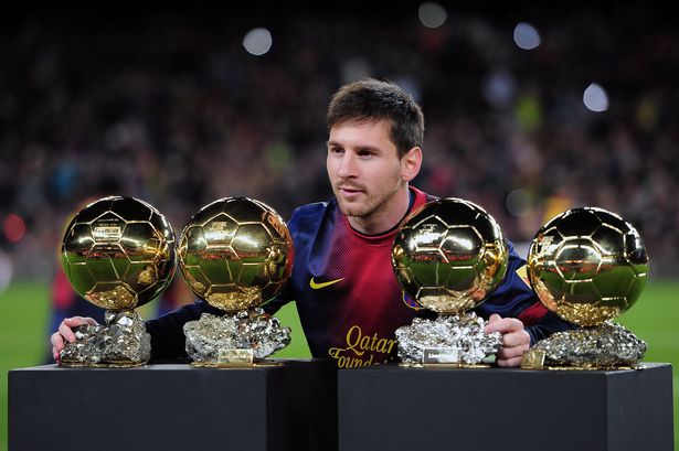 barcelonas-argentinian-forward-lionel-messi-poses-with-his-4-fifa-ballon-dor-trophies-prior-to-the-spanish-copa-del-rey-1404807659-1411481622