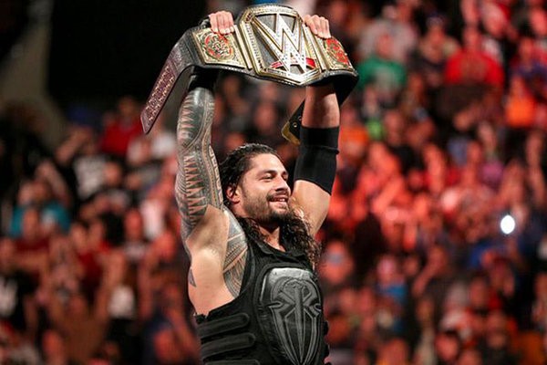 WWE shows off Roman Reigns' new championship belt with impressive side ...