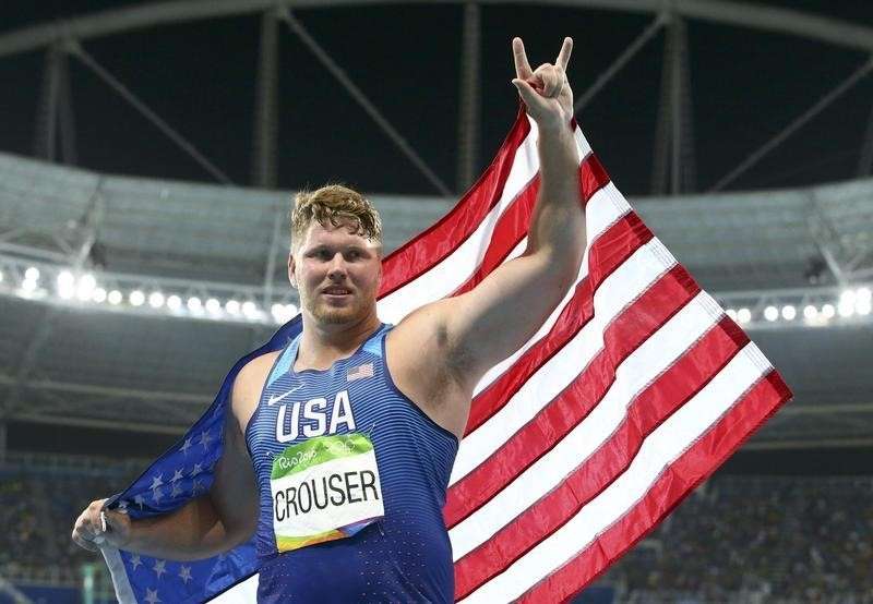 Athletics - American Crouser wins shot put gold, breaks Olympic record