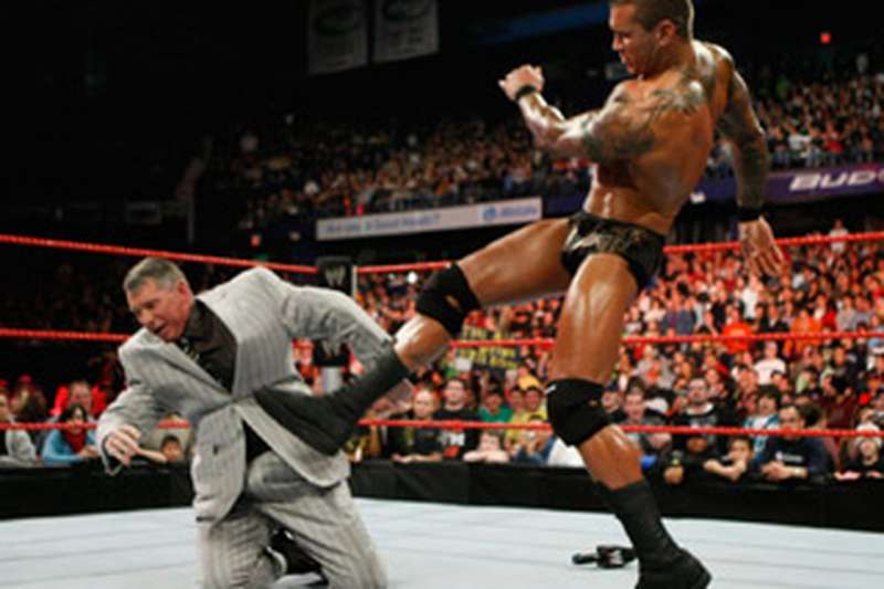 Randy Orton punt kicking Vince McMahon on Monday Night Raw