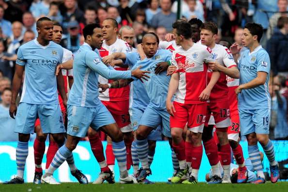 144369602-joey-barton-of-qpr-causes-a-fracas-after-gettyimages-1483619941-800.jpg