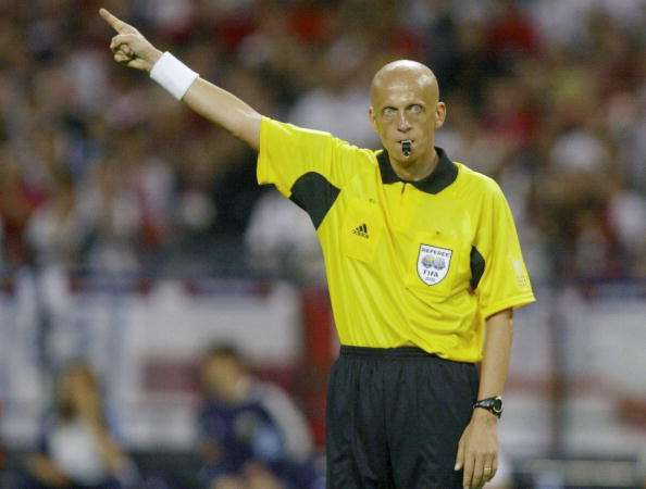 Why do football referees wear black or yellow?