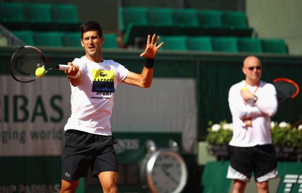 coach-andre-agassi-watches-on-during-a-novak-djokovic-training-prior-picture-id690388036-800.jpg